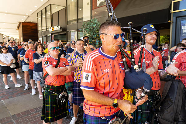 Scotland fans play bagpipes